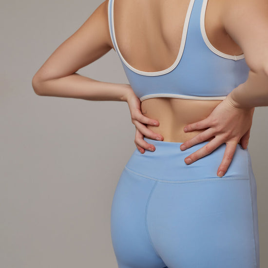 Top Essential Azul Cielo Doblefit, top deportivo mujer, vista posterior