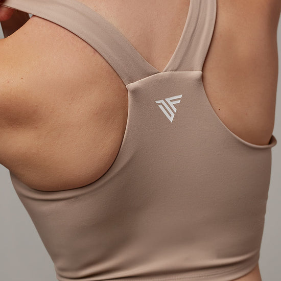 Top Dunas Crema Doblefit, top deportivo mujer, vista posterior