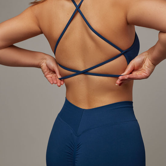 Top Strong Navy Doblefit, top deportivo mujer, vista posterior