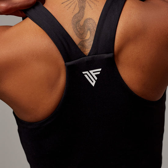 Top Dunas Negro Doblefit, top deportivo mujer, vista posterior