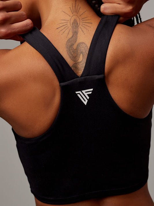 Top Dunas Negro Doblefit, top deportivo mujer, vista posterior