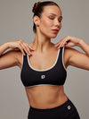 Top Essential Negro Doblefit, top deportivo para mujer, vista principal